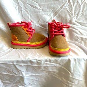 Brand new toddler’s multi-colored UGGs.